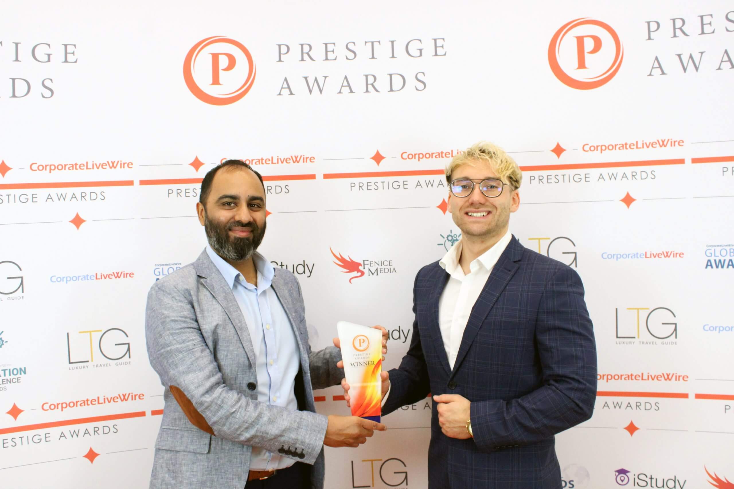 Mohammed Vaseem accepts award on behalf of Veritas Hearing UK for Hearing Healthcare provider of the year 2022-2023