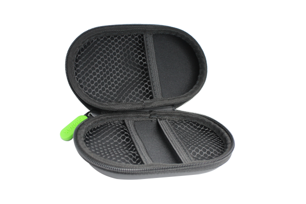 The inside of a black hearing aid storage case.
