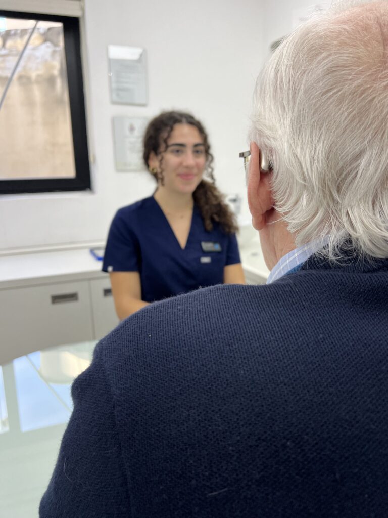 A patient having his hearing tested.